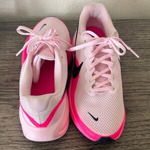 Nike Women’s Light Pink and Hot Pink Running Shoes with Black Swoosh